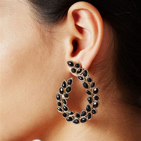 Designer Earrings For Women & Men .